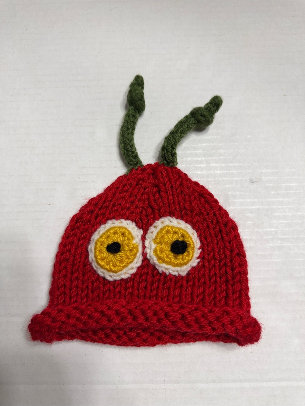 Red Knit Kids Beanie with Yellow Eye Detail and Green Antennae